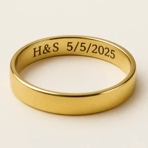 Gold ring engraved inside with "H&S 5/5/2025" artdecoinc.ca